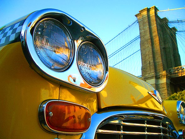 Headlight of Classic Yellow Taxi Car